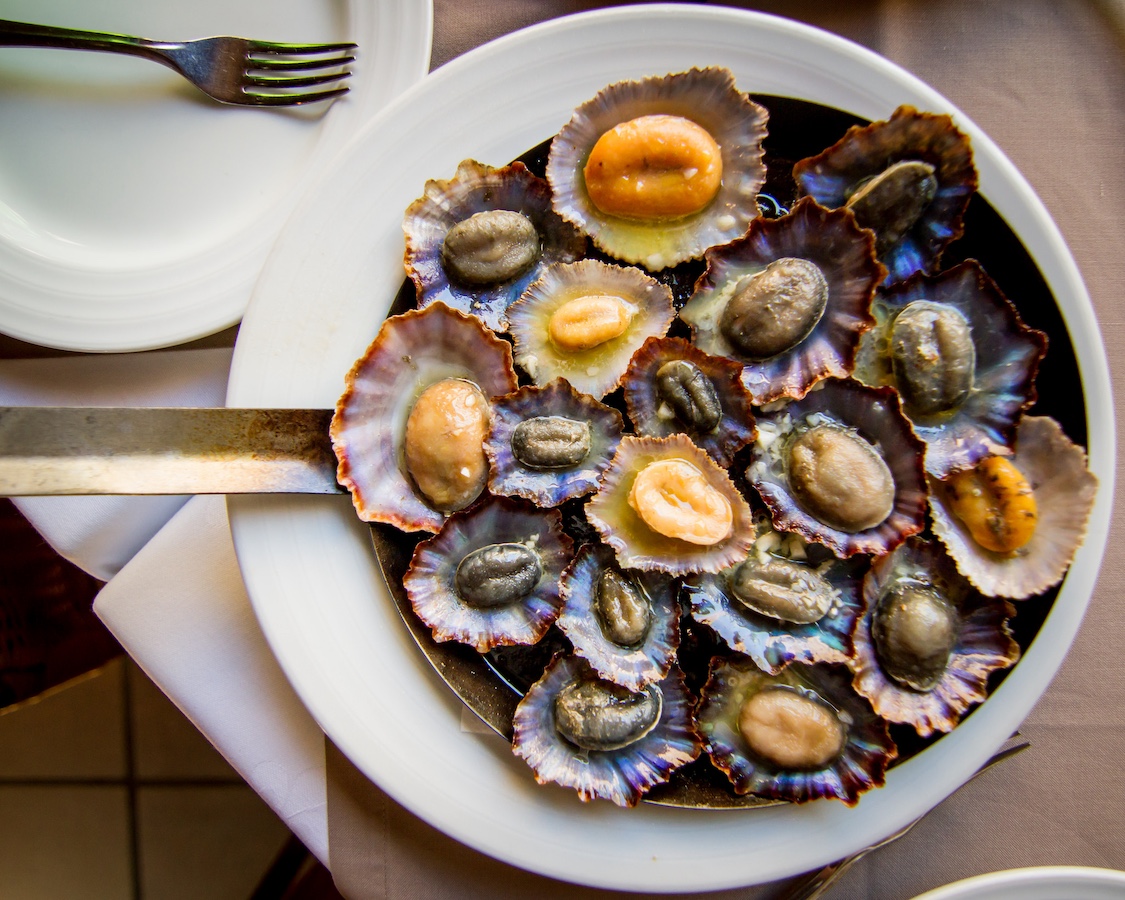 A table of Portuguese food and drinks